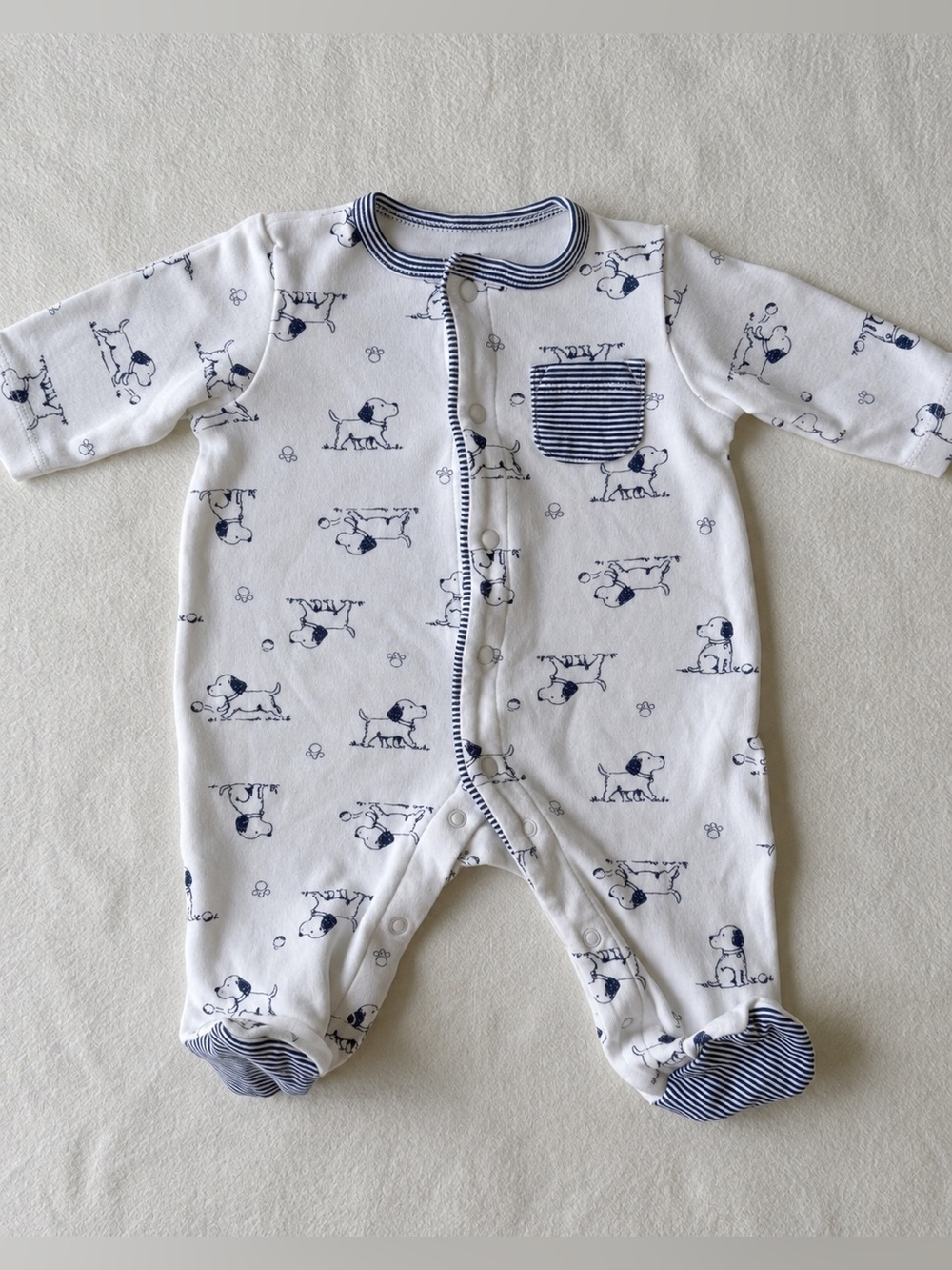 Little Me White and Navy Puppy Print Newborn Footed One-Piece